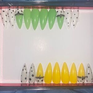 Play mix and match with these 2 sets of stiletto press on nails